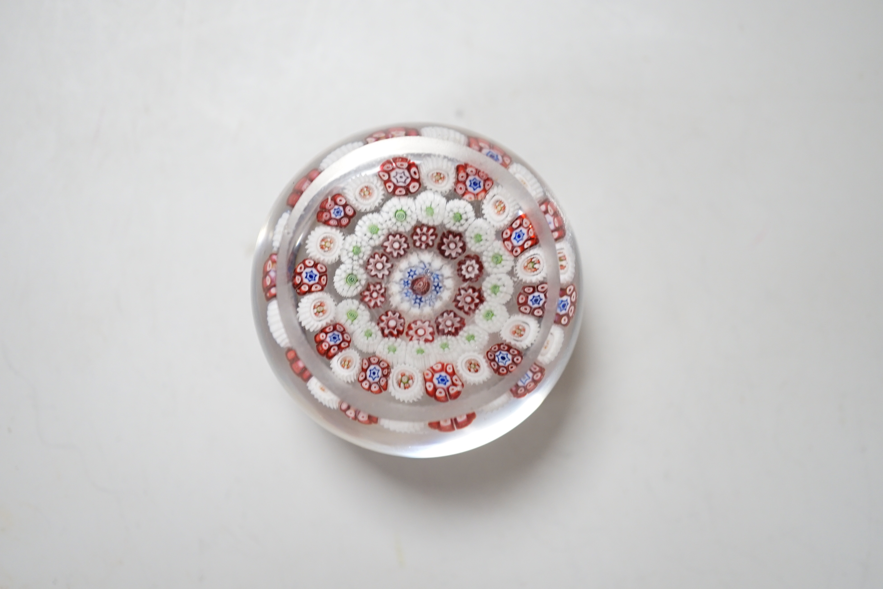 A Baccarat concentric millefleur cane paperweight, approximate diameter 4.25